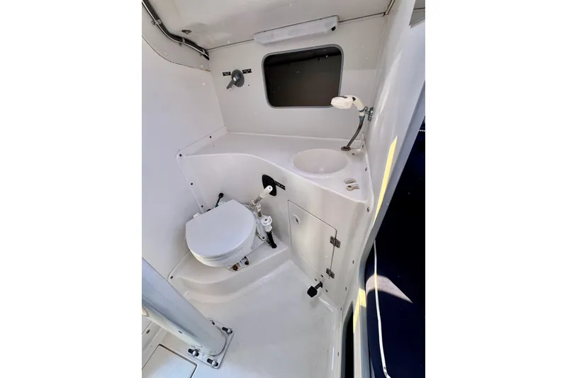 Slide: The Image of 1999 J Boats J/105 interior bathroom with toilet and sink. - 19