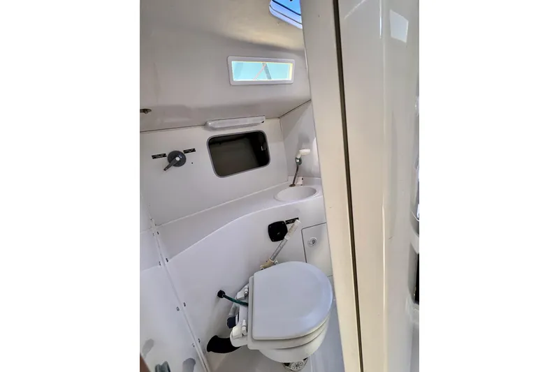 Slide: The Image of 1999 J Boats J/105 interior bathroom with toilet and sink. - 21