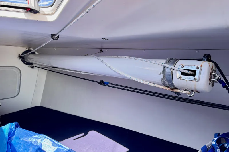 Slide: The Image of Interior view of a 1999 J Boats J/105 sailboat, showing mast and rigging. - 35