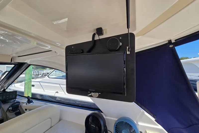 Slide: The Image of Interior of 2018 Regal 35 Sport Coupe with mounted TV and fan. - 15