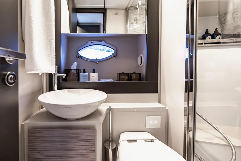 Slide: The Image of Luxurious bathroom in 2021 Pershing 62 yacht with modern fixtures and elegant design. - 107