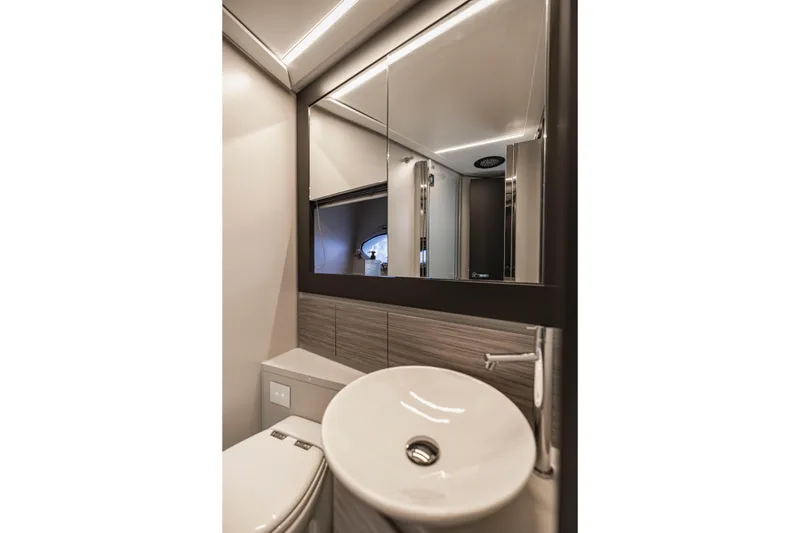 Slide: The Image of Luxurious bathroom interior of 2021 Pershing 62 yacht with modern fixtures and elegant design. - 117