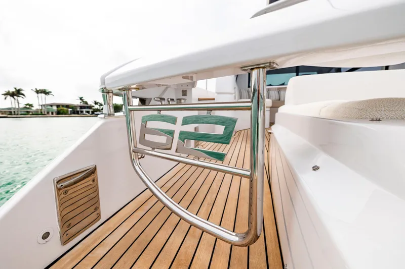 Slide: The Image of 2021 Pershing 62 yacht deck with sleek design and modern features. - 34
