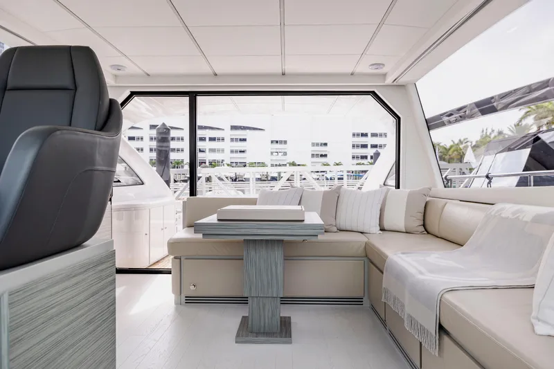 Slide: The Image of Luxurious interior of 2021 Pershing 62 yacht with elegant seating and modern design. - 37