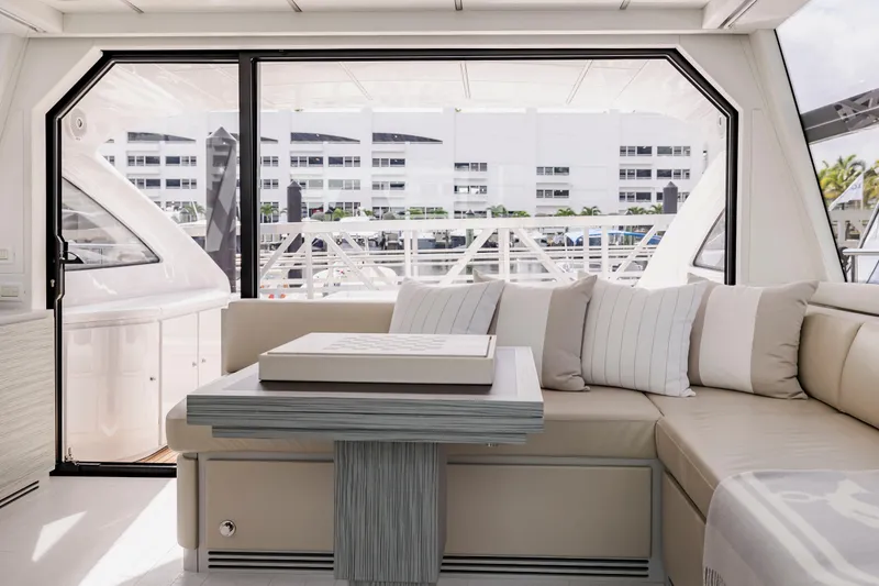 Slide: The Image of Luxurious interior of 2021 Pershing 62 yacht with elegant seating and modern design. - 38
