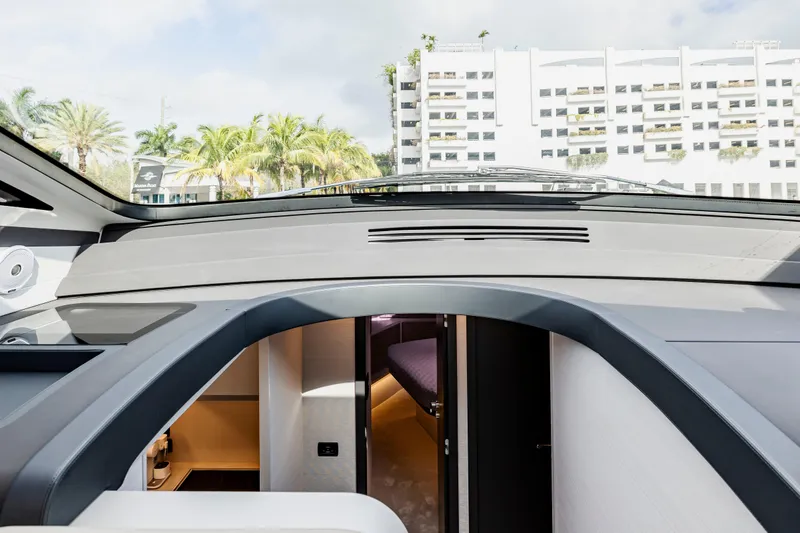 Slide: The Image of Interior view of 2021 Pershing 62 yacht with modern design and luxurious cabin. - 46