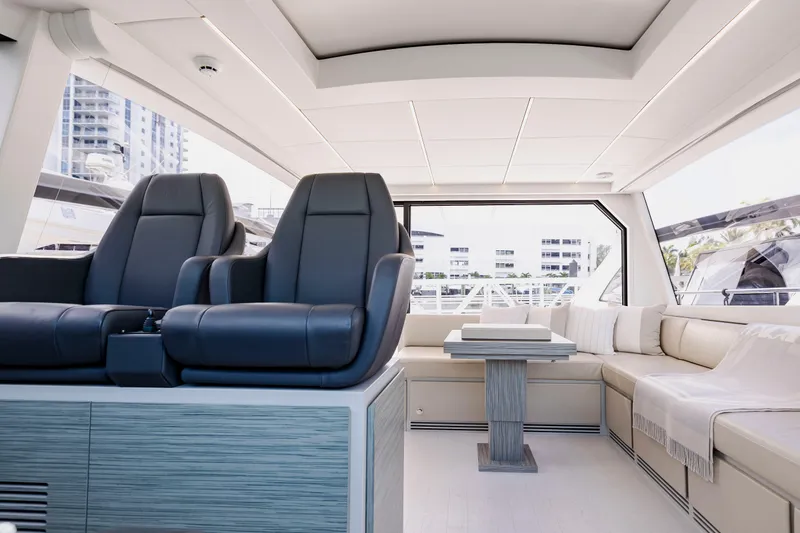 Slide: The Image of Luxurious interior of 2021 Pershing 62 yacht with plush seating and modern design. - 47