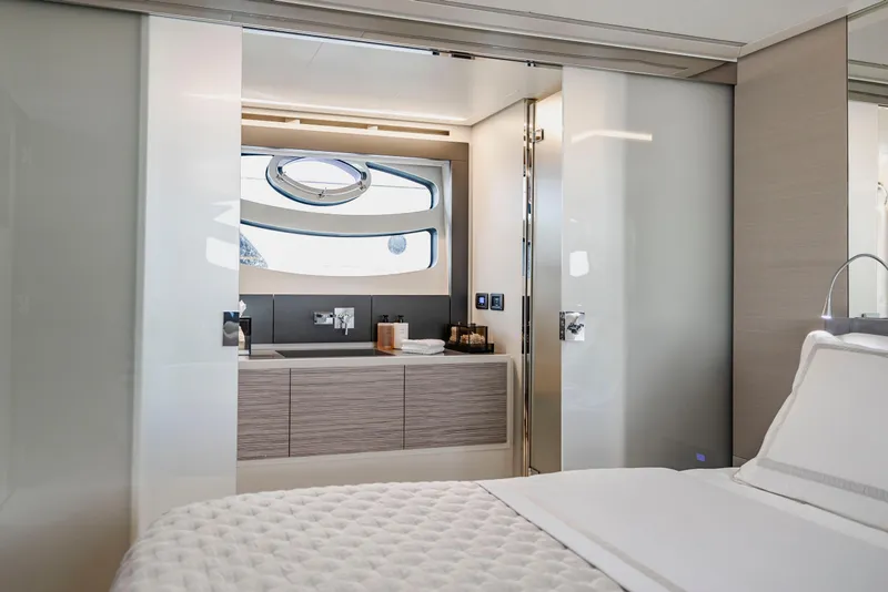 Slide: The Image of Luxurious interior of 2021 Pershing 62 yacht featuring modern bathroom design. - 73