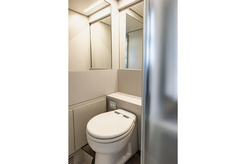 Slide: The Image of Modern bathroom interior on 2021 Pershing 62 yacht, featuring sleek design and fixtures. - 80
