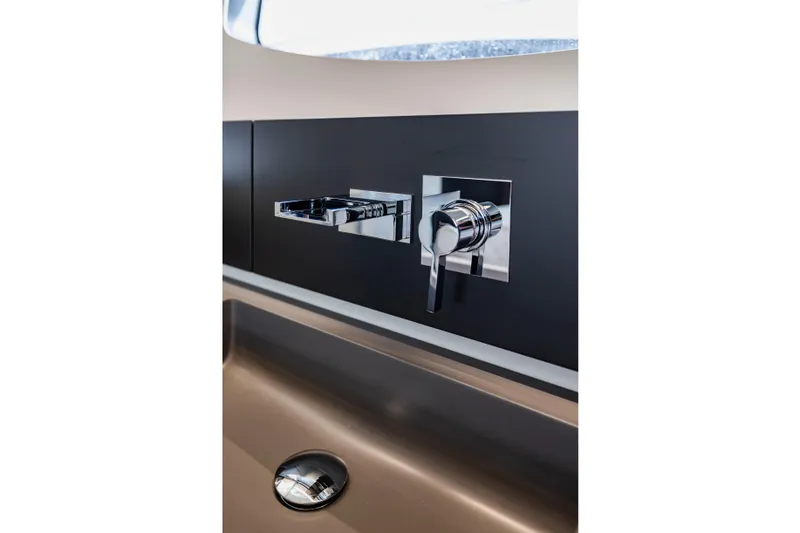 Slide: The Image of Modern chrome faucet in 2021 Pershing 62 yacht bathroom. - 87