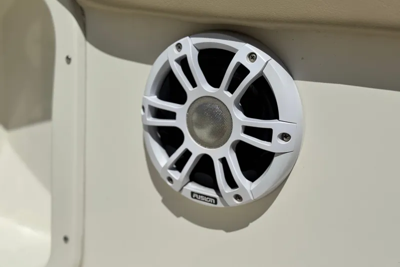 Slide: The Image of White Fusion speaker on 2019 Stingray 206 CC boat interior. - 22