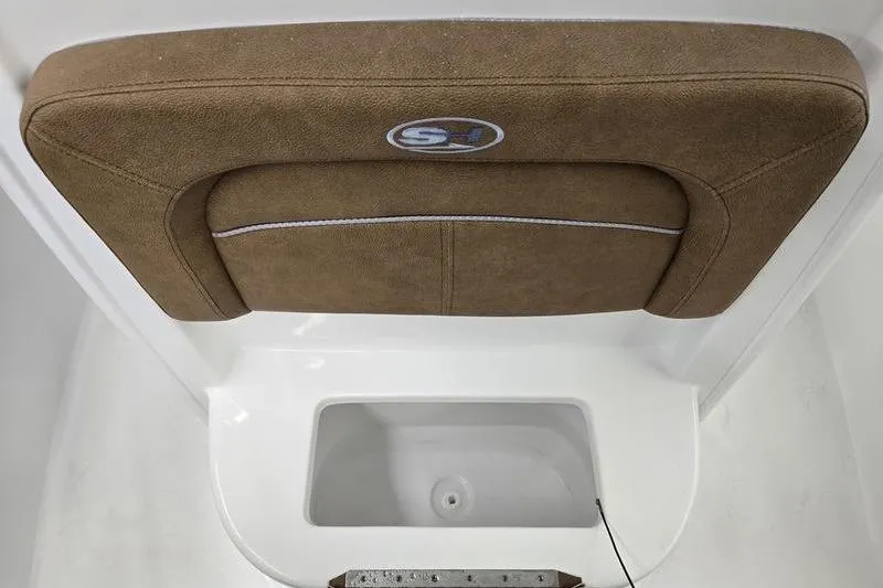 Slide: The Image of 2026 Sea Hunt Ultra 245 SE boat seat with storage compartment. - 14