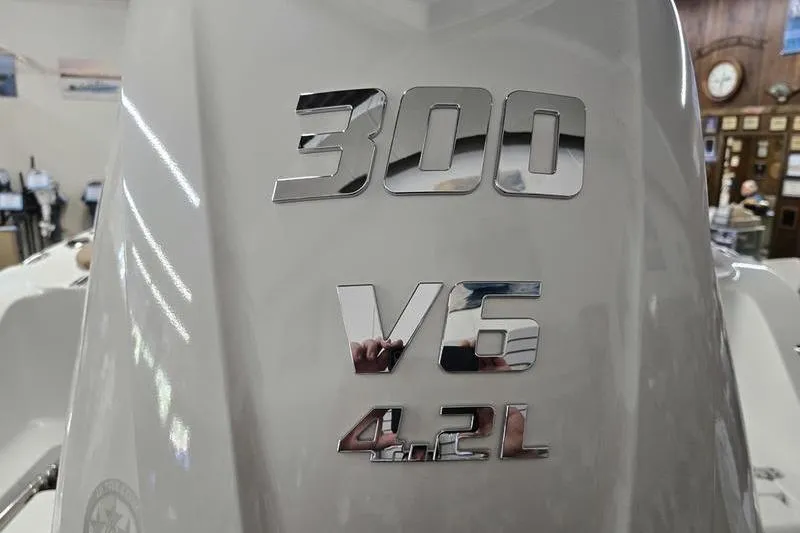 Slide: The Image of Sea Hunt Ultra 245 SE 2026 boat engine, 300 V6 4.2L, close-up view. - 20