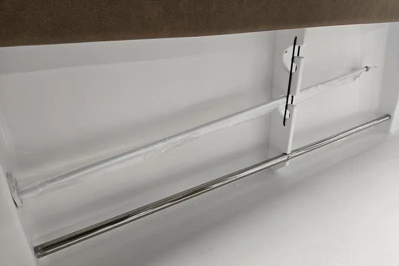 Slide: The Image of 2026 Sea Hunt Ultra 245 SE interior detail with stainless steel rod holders. - 8