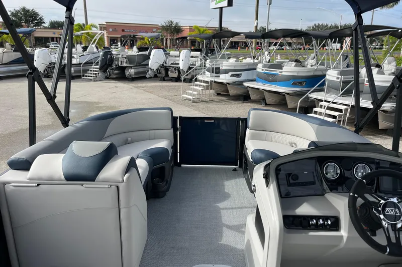 Slide: The Image of 2026 Avalon 2385 LSZ Quad Lounger Tri Toon interior, showcasing luxury seating and modern dashboard. - 15