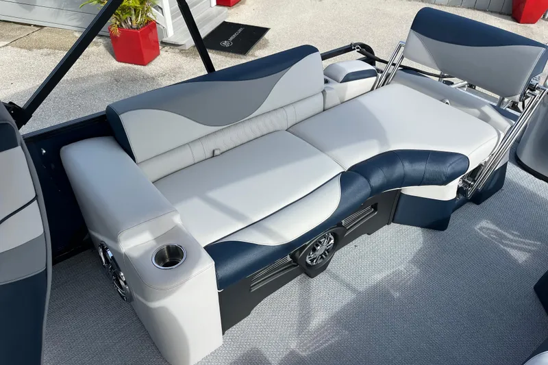 Slide: The Image of Luxurious seating on 2026 Avalon 2385 LSZ Quad Lounger, featuring sleek design and cup holders. - 20