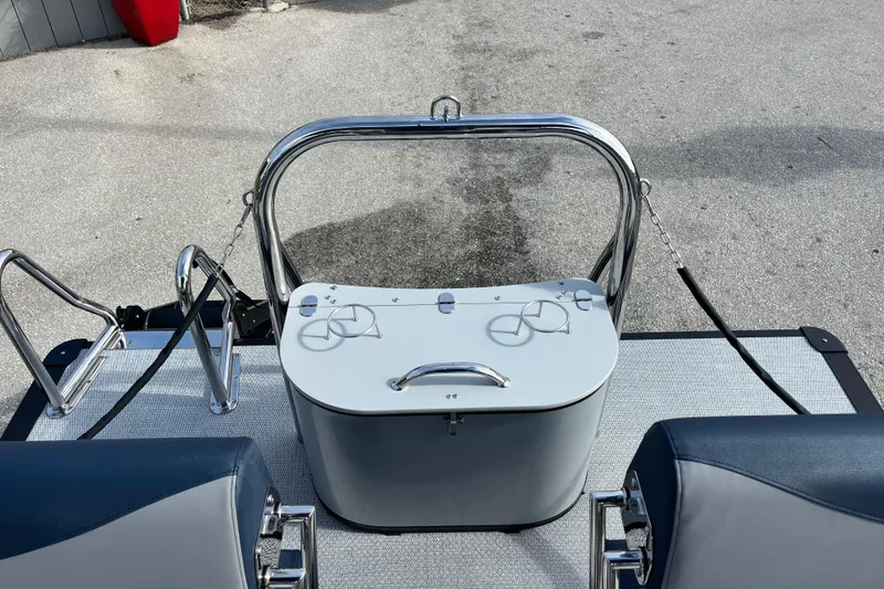 Slide: The Image of 2026 Avalon 2385 LSZ Quad Lounger boat deck with stainless steel railings and seating. - 21