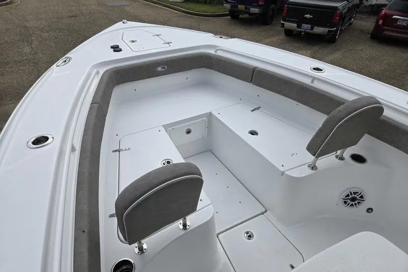 Slide: The Image of 2026 Sea Hunt Ultra 275 SE boat interior with seating and storage compartments. - 15