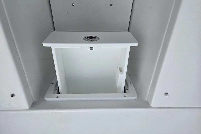 Slide: The Image of Storage compartment on 2026 Sea Hunt Ultra 275 SE boat, featuring a sleek white design. - 16
