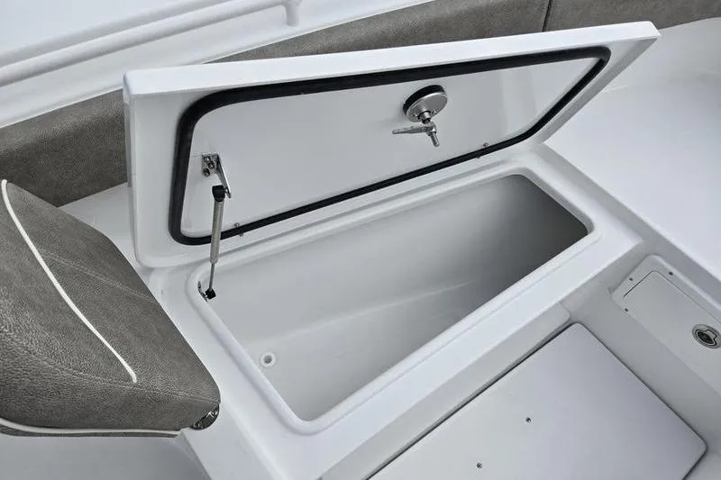 Slide: The Image of Open storage compartment on 2026 Sea Hunt Ultra 275 SE boat. - 20