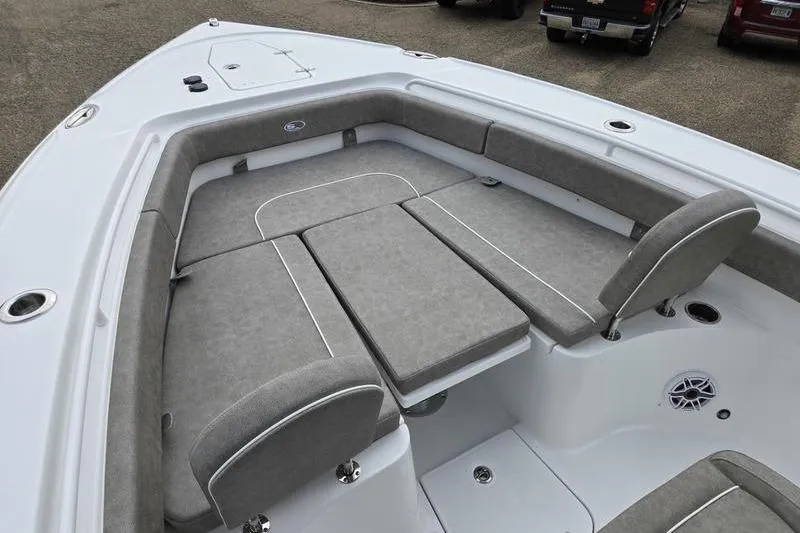 Slide: The Image of 2026 Sea Hunt Ultra 275 SE boat interior with gray cushioned seating. - 22