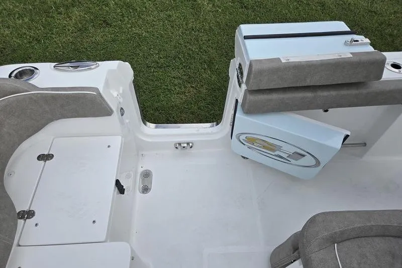 Slide: The Image of 2026 Sea Hunt Ultra 275 SE boat interior with seating and storage compartments. - 6