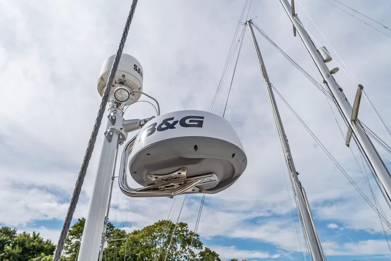 Slide: The Image of Radar equipment on Italia Yachts 13.98, 2015 model, against a cloudy sky. - 18