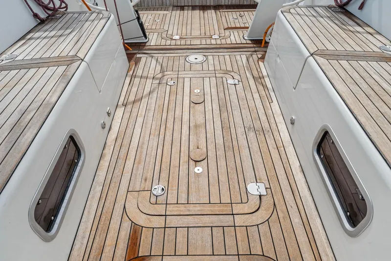Slide: The Image of Teak deck of 2015 Italia Yachts 13.98, showcasing elegant wood finish and craftsmanship. - 23