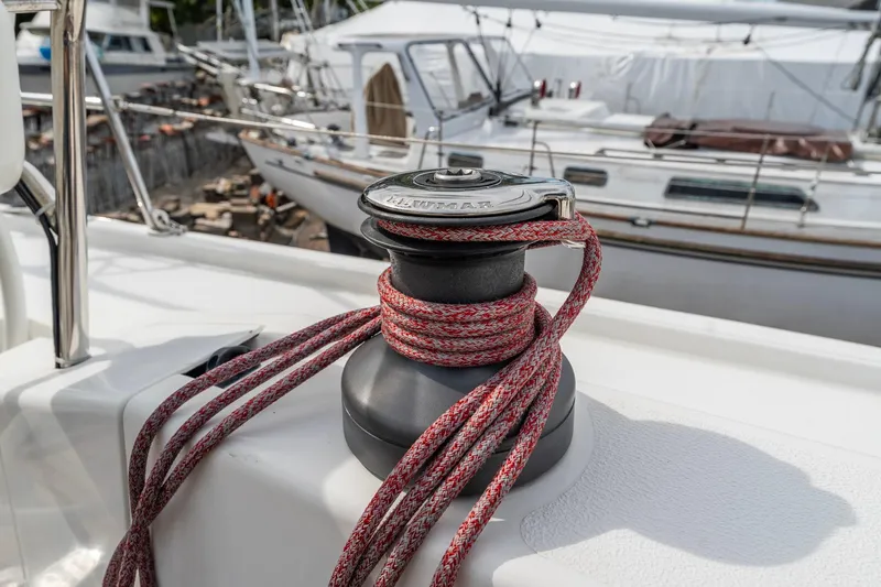 Slide: The Image of Italia Yachts 13.98 (2015) sailboat winch with red rope, docked in marina. - 25