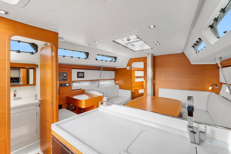 Slide: The Image of Luxurious interior of 2015 Italia Yachts 13.98, featuring modern design and elegant wood finishes. - 28