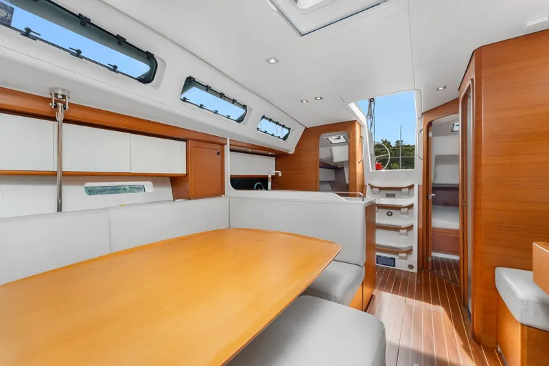 Slide: The Image of Luxurious interior of 2015 Italia Yachts 13.98, featuring elegant wood finishes and modern design. - 31