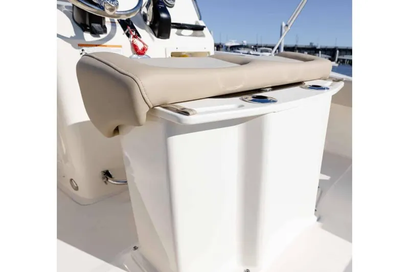 Slide: The Image of Manufacturer Provided Image: 2025 Scout 195 Sportfish boat seat with beige cushion and cup holders. - 6
