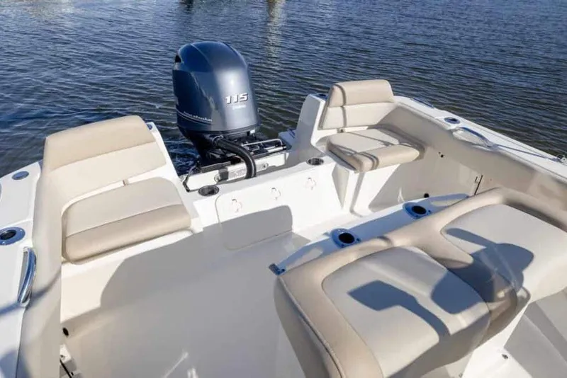 Slide: The Image of Manufacturer Provided Image: 2025 Scout 195 Sportfish boat interior with seating and outboard motor. - 8