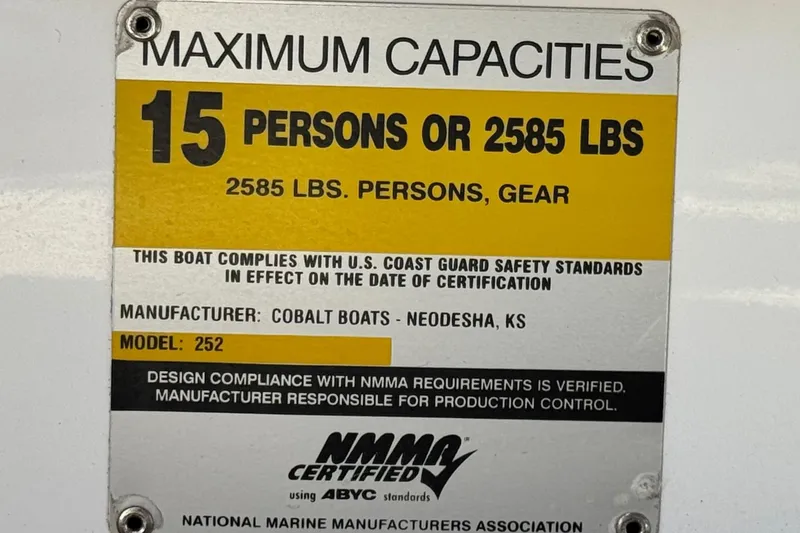 Slide: The Image of 2008 Cobalt 262 capacity plate: 15 persons or 2585 lbs, NMMA certified. - 30