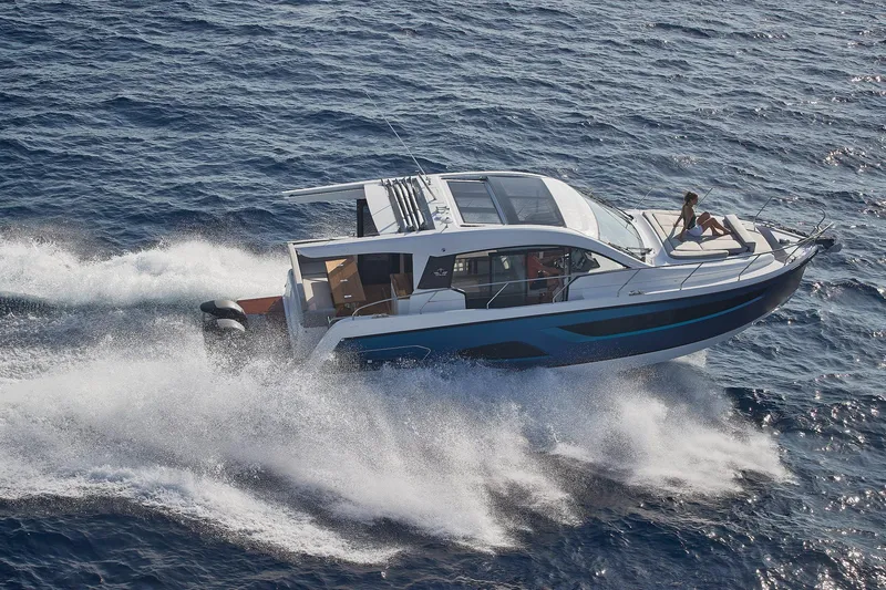 Slide: The Image of 2026 Sealine C390 yacht cruising on open water, creating a dynamic wake. - 3