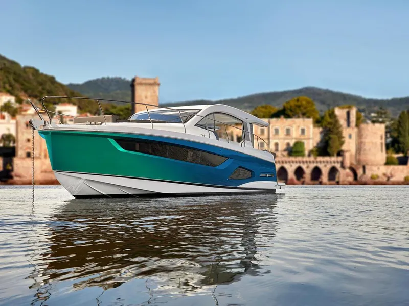 Slide: The Image of 2026 Sealine C390 yacht on calm water with scenic historic backdrop. - 33