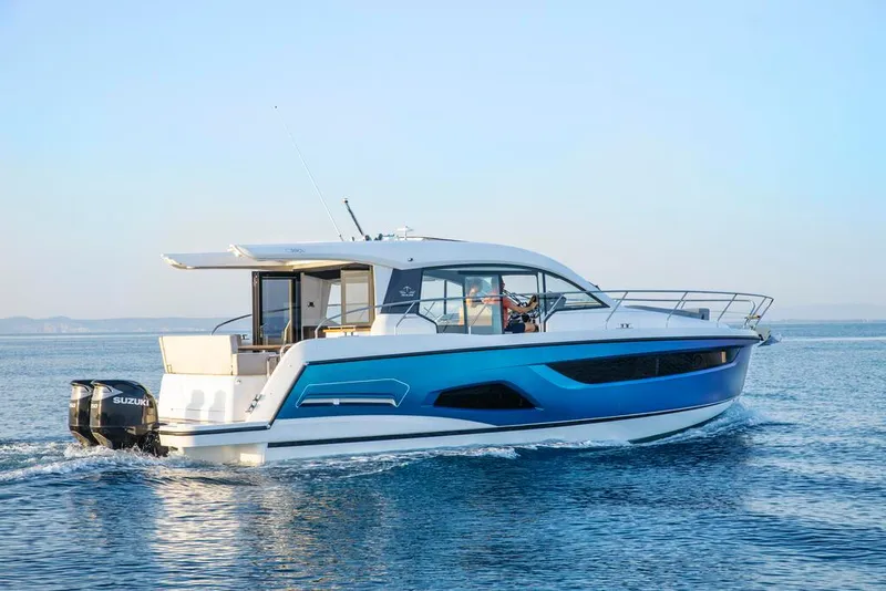 Slide: The Image of 2026 Sealine C390 yacht cruising on calm blue waters. - 6
