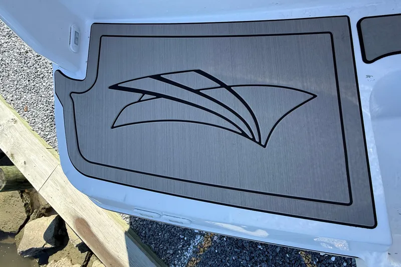 Slide: The Image of 2026 Cutwater C-248 Coupe boat deck with sleek design pattern. - 5