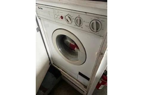 Slide: The Image of Washing machine inside a 1990 Hatteras 40 Motor Yacht. - 15