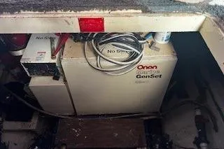 Slide: The Image of Engine room of 1990 Hatteras 40 Motor Yacht with Onan Marine GenSet. - 16