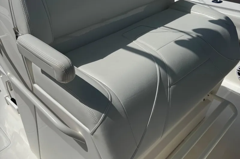 Slide: The Image of 2024 SeaVee 32Z boat seat with sleek, modern design and comfortable armrest. - 13