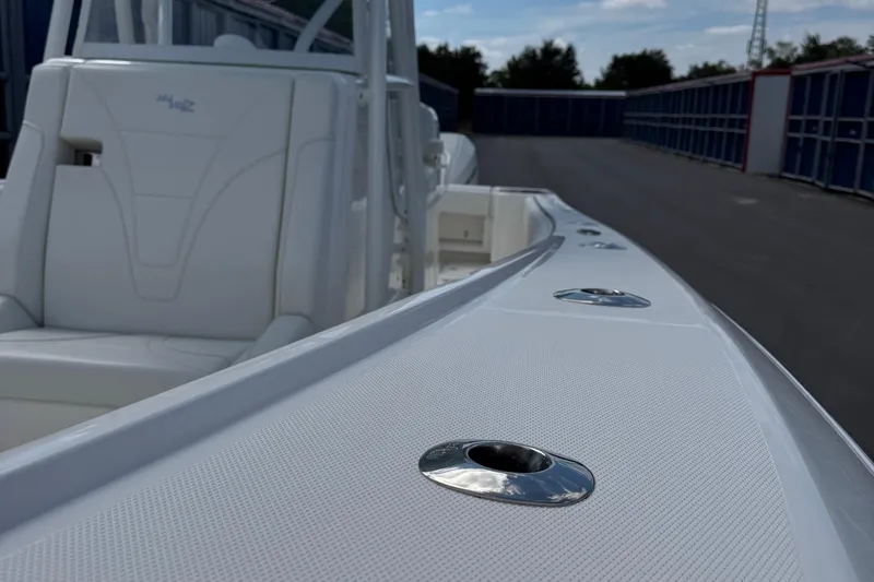 Slide: The Image of 2024 SeaVee 32Z boat deck with sleek design and stainless steel fittings. - 23