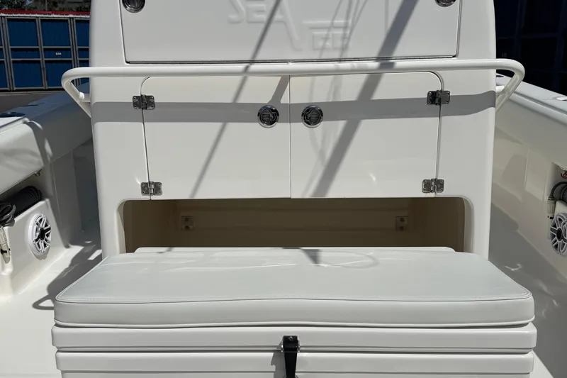 Slide: The Image of 2024 SeaVee 32Z boat interior with cushioned seating and storage compartments. - 27