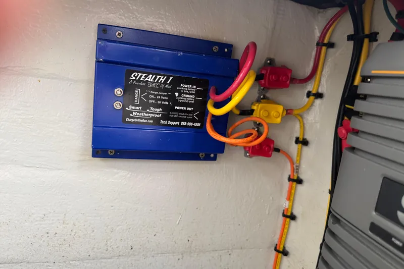 Slide: The Image of Electrical system in a 2024 SeaVee 32Z boat featuring a Stealth I charger. - 34