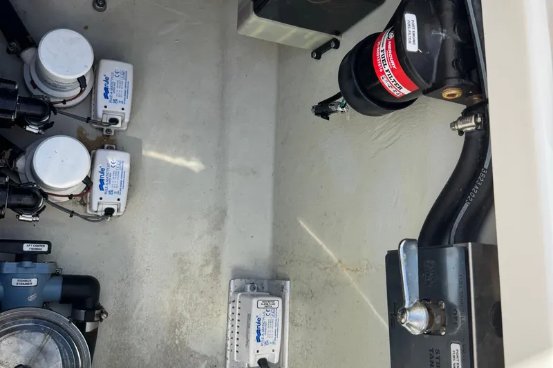 Slide: The Image of 2024 SeaVee 32Z boat interior showing pumps and mechanical components. - 36