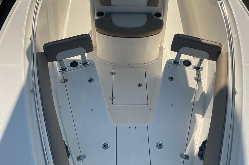 Slide: The Image of 2023 Sea Born SX239 Offshore boat interior with seating and storage compartments. - 39