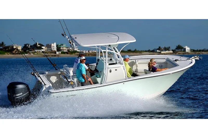 Slide: The Image of 2023 Sea Born SX239 Offshore boat interior with modern helm and seating. - 5