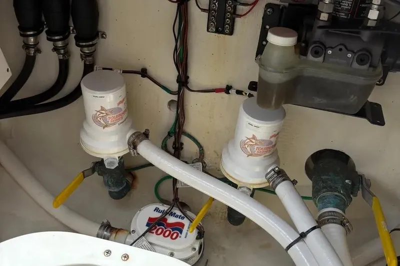 Slide: The Image of 2017 Jupiter 38 FS boat bilge area with pumps and wiring. - 25
