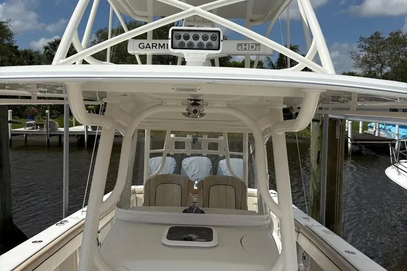 Slide: The Image of 2017 Jupiter 38 FS boat with Garmin xHD2 radar, docked by the water. - 26