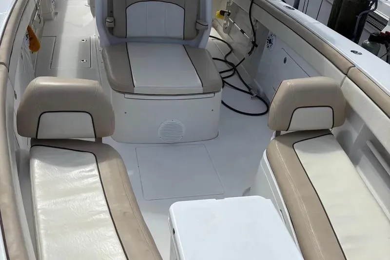 Slide: The Image of 2017 Jupiter 38 FS boat interior with beige seating and white deck. - 28